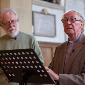 Vicars leading a service